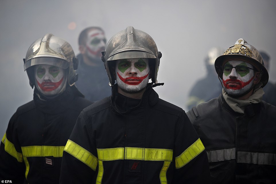 23987304 7938937 Some firefighters with their face painted with the movie charact a 27 1580235649290