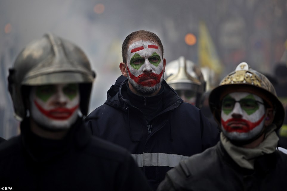 23987794 7938937 Some firefighters with their face painted with the movie charact a 11 1580235649231