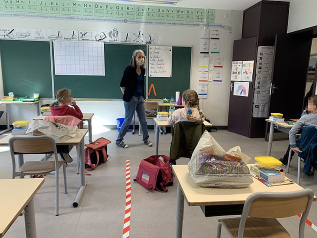 Kids in France are Forced to Play in Isolation at Schools 3 28334178 8314697 Classrooms also included floor markings with desks spaced out to a 3 1589359326276