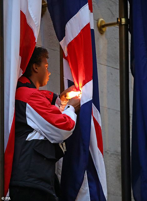 All European and American statues are being Torn down, Our History is being Erased while YOU Do Nothing 11 29337452 8401935 A protester tries to set fire to the Union Jack flag at the ceno a 49 1591772975571