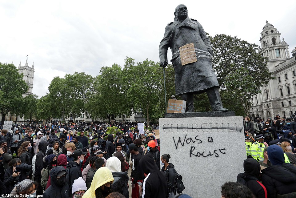 All European and American statues are being Torn down, Our History is being Erased while YOU Do Nothing 10 29354286 8401935 Activists stand around the Churchill statue after it was daubed a 61 1591772977559