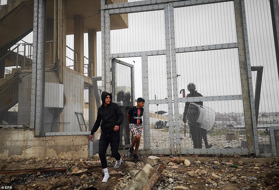Spain Deploys Army to AID TENS OF THOUSANDS of Moroccans and Africans to Invade their Country 8 43125111 9591093 Many African migrants regard Ceuta and nearby Melilla also a Spa a 451 1621343366118