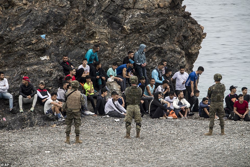 Spain Deploys Army to AID TENS OF THOUSANDS of Moroccans and Africans to Invade their Country 6 43125189 9591093 It s such a strong invasion that we are not able to calculate t a 443 1621343366110