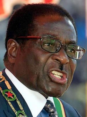 Mugabe Wants All White Farmers Out Of Zimbabwe 1 mugabe crazy