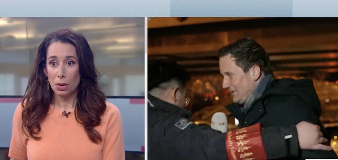 Chinese authorities physically drag away Dutch reporter doing live broadcast in viral video 1 SNF6IEU