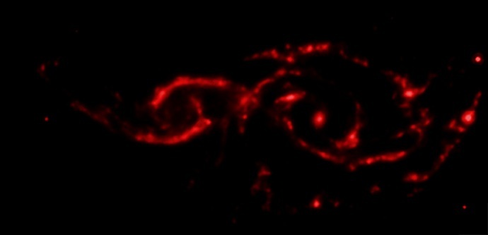 Galaxies spiral into each other, create spectacular light show 4 121814 ngc2207 ir