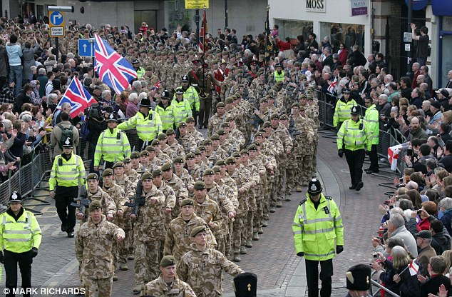 Muslim protesters 'branded British soldiers rapists and baby killers during homecoming parade' 4 Proud: The Royal Anglian Regiment, marching along Watford High St in Luton