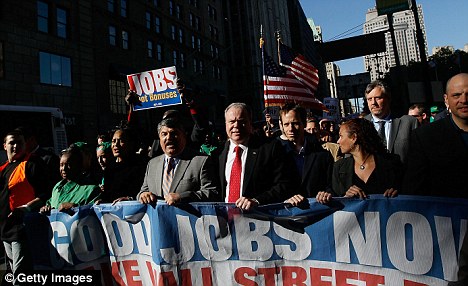Goldman Sachs facing a U.S. criminal probe into fraud on a historic scale 6 AFL-CIO president Richard Trumka (centre) led a protest march against Wall Street down Broadway in lower Manhattan yesterday