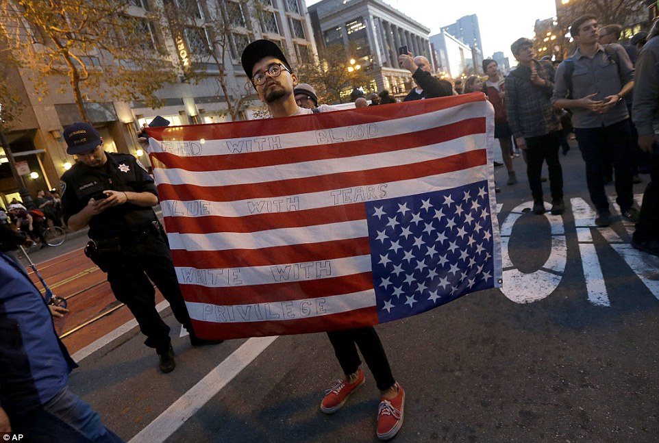 Riots Getting out of Control, They are now shouting "Kill Trump" 37 3A37C51E00000578 3922098 San Francisco This man expressed his anger by graffiti ing the U a 27 1478778493545