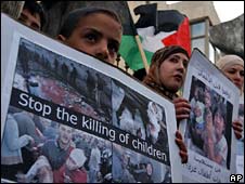 UN Expert Stands by Holocaust Remark 2 Palestinian children protest against Israeli actions in Gaza, 3 March 2008