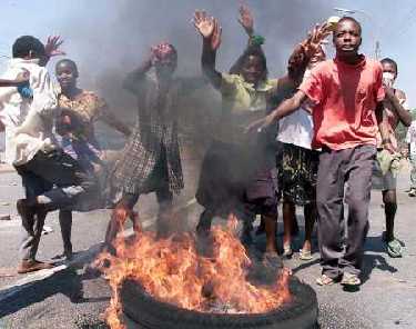 An American writes: The Transformation of America into Zimbabwe is inevitable 1 1017burning tire