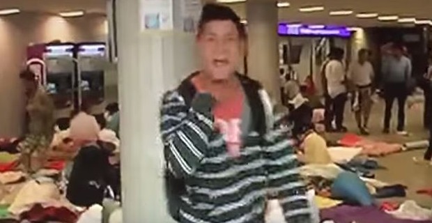 Migrant Crisis Exposed! Most of the "Refugees" are Not Even from Syria 1 migrant throat